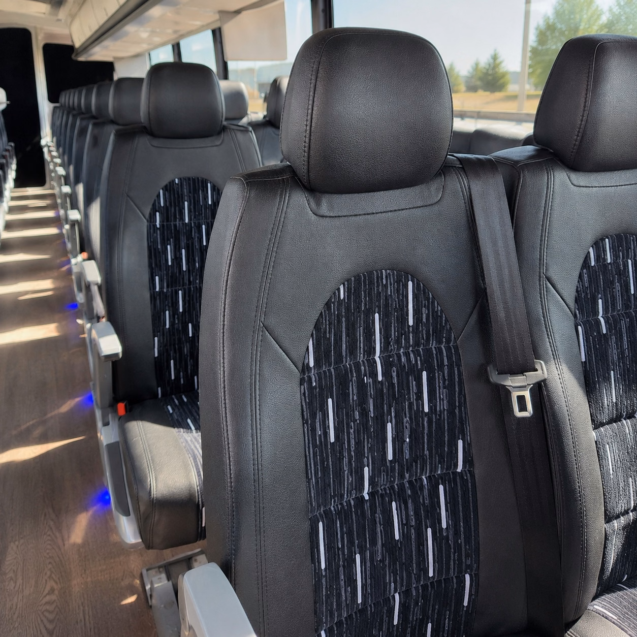 how trip distance and duration affect charter bus rates in midland